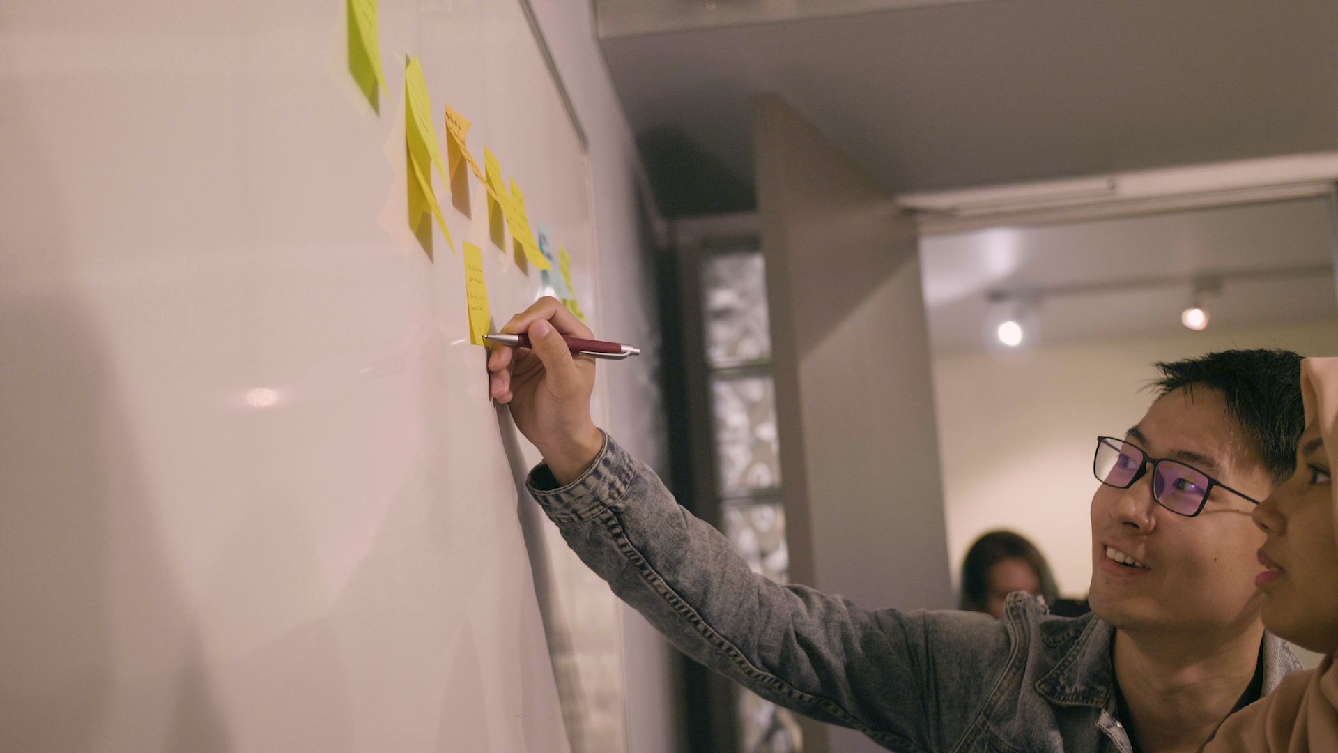 sticking a post it note sticking a post it note
